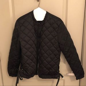 Reversible quilted bomber jacket with tie lace up